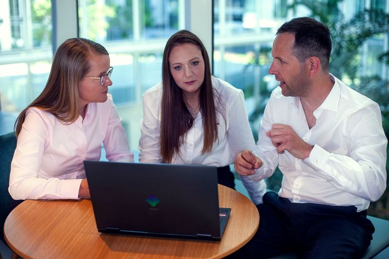 Photograph of a team working together